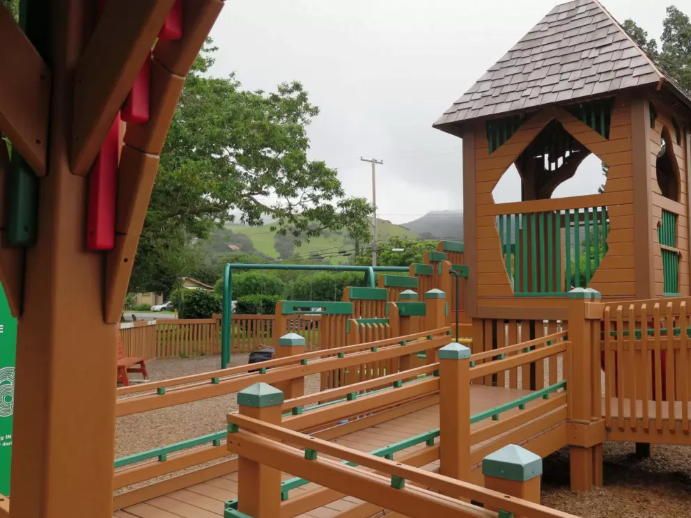 Lovely castle playground and mountains behind.