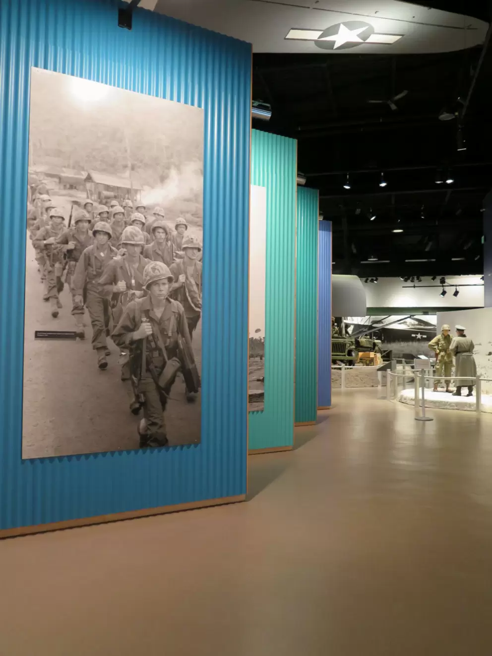 Tall photos of military men.