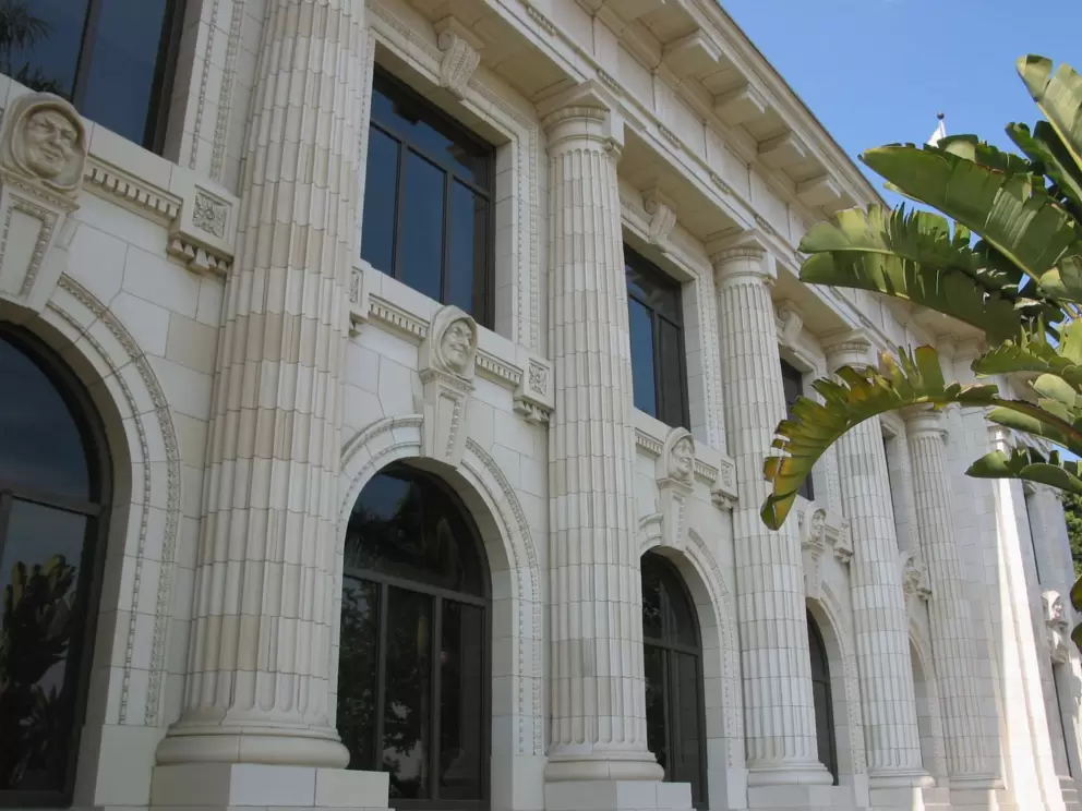 Doric columns and terra cotta friars' heads. 