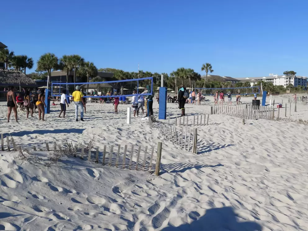 Sand volleyball near Tiki Hut.