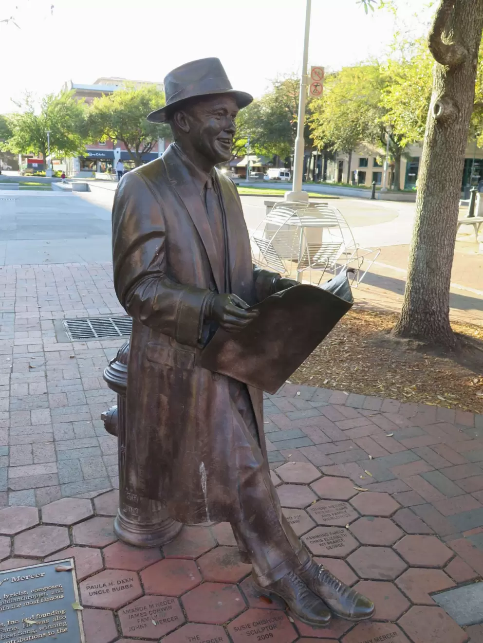 Statue, in Ellis Square, of Johnny Mercer, composer of nearly 1200 songs, including "Moon River." He co-founded Capitol Records and won four Oscars.