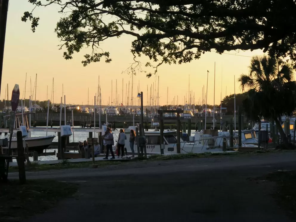 Sunset on Brunswich Street, with boats at Southport Marina in the distance.