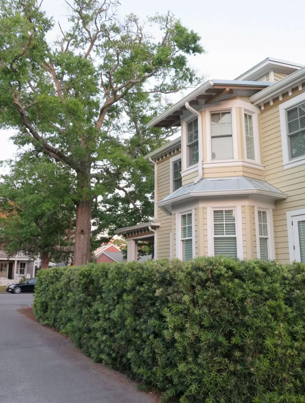 Short Street home with side tower.