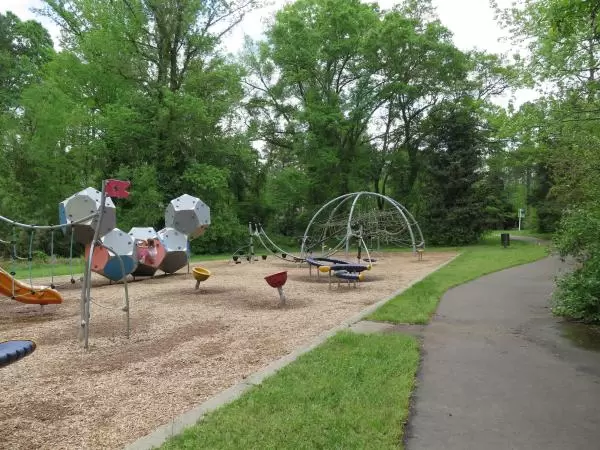 Greenway alongside the playground, where little ones can ride their tricycle.