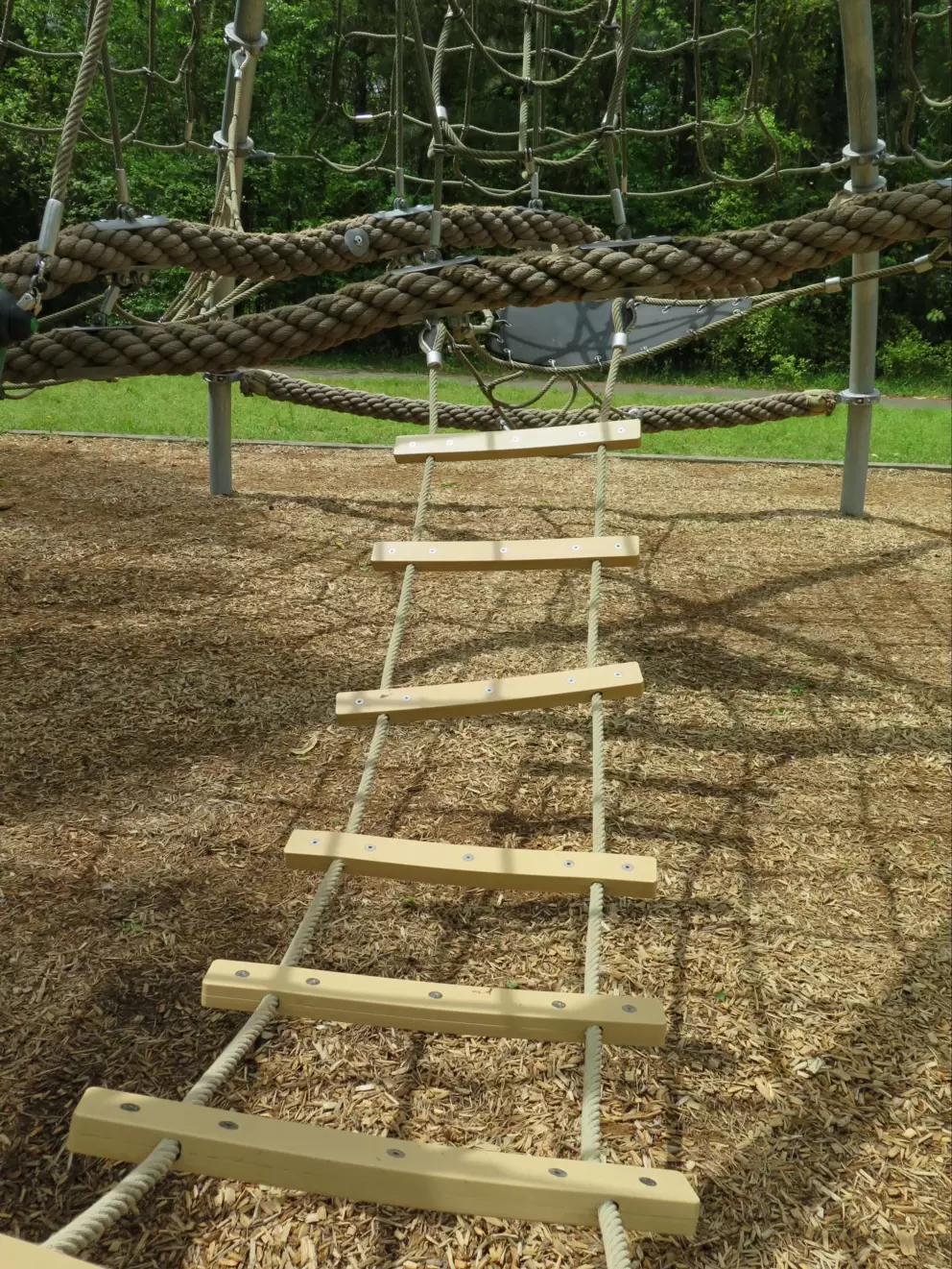 Wooden ladder in the rope structure.
