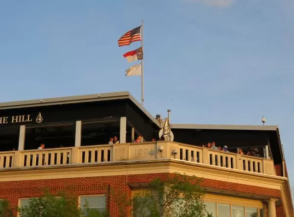 Hanging out on the balcony of Top of the Hill, in the golden light of sunset.