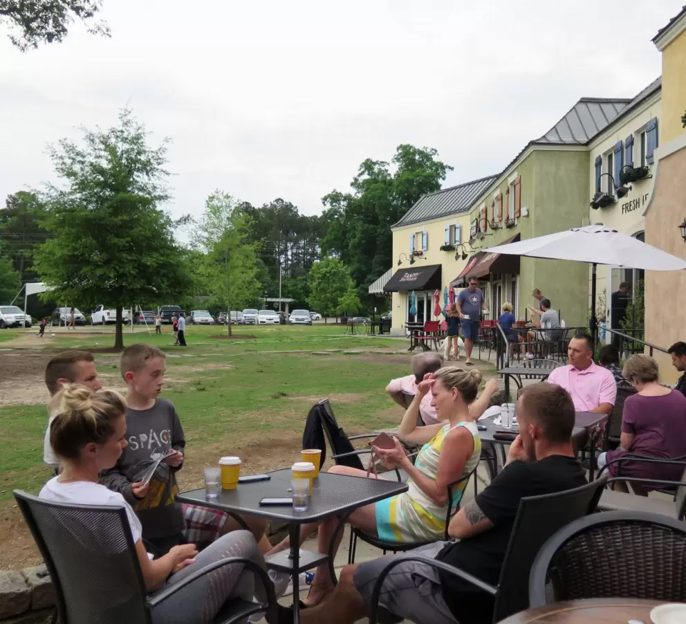 Family dining near the lawn.