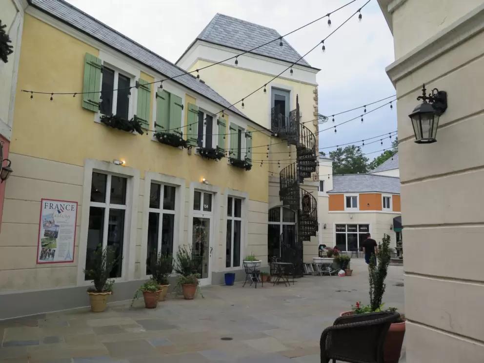 The look of the architecture is stark even though it aims to be French.