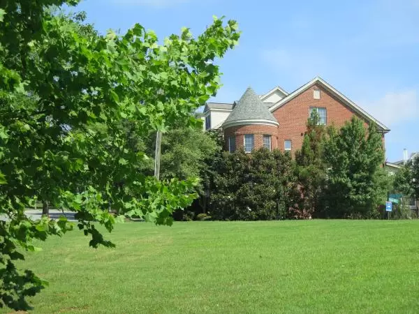 Cute turret on a brick home.
