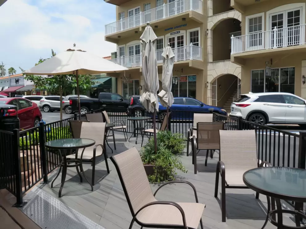 Seating outside Stuart Coffee Shop.