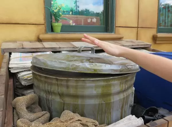 Push on Grover's trash can to hear his rebuke!