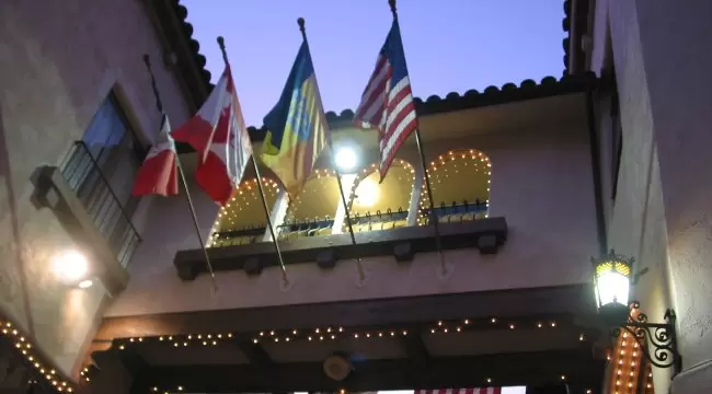 Little Spanish archways lit up at night. 
