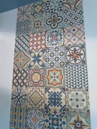 All different tiles in a guest bathroom at the Fenway Hotel.