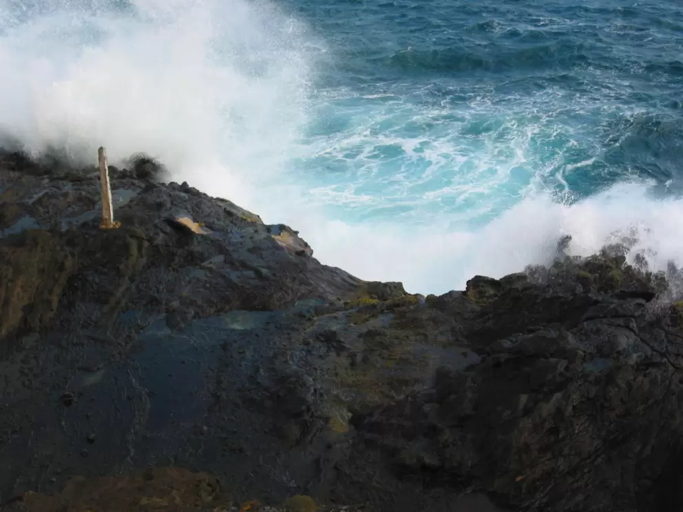 A blast of water spurts out at Halona Blowhole.