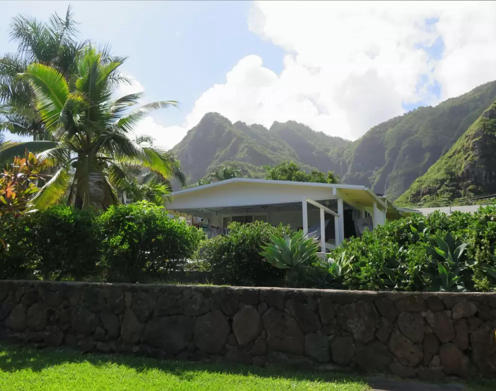 House with a mountain view in the back.