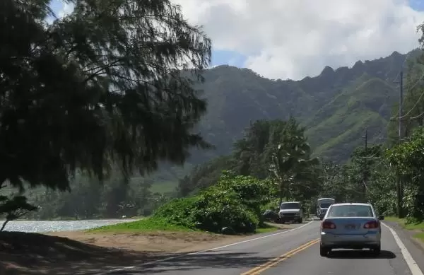 The road goes along the water.