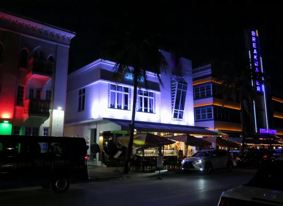 Voodoo Miami, lit at night.