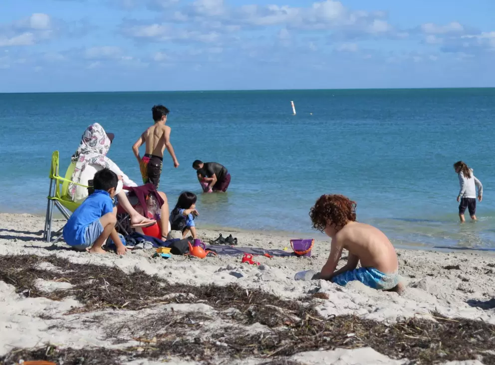Kids enjoying the shore.