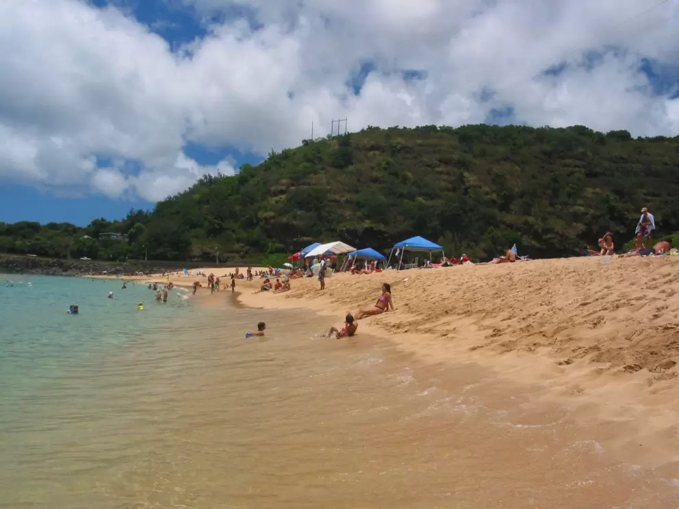 The sloping shore where you can let the little waves pull you up and down- fun!