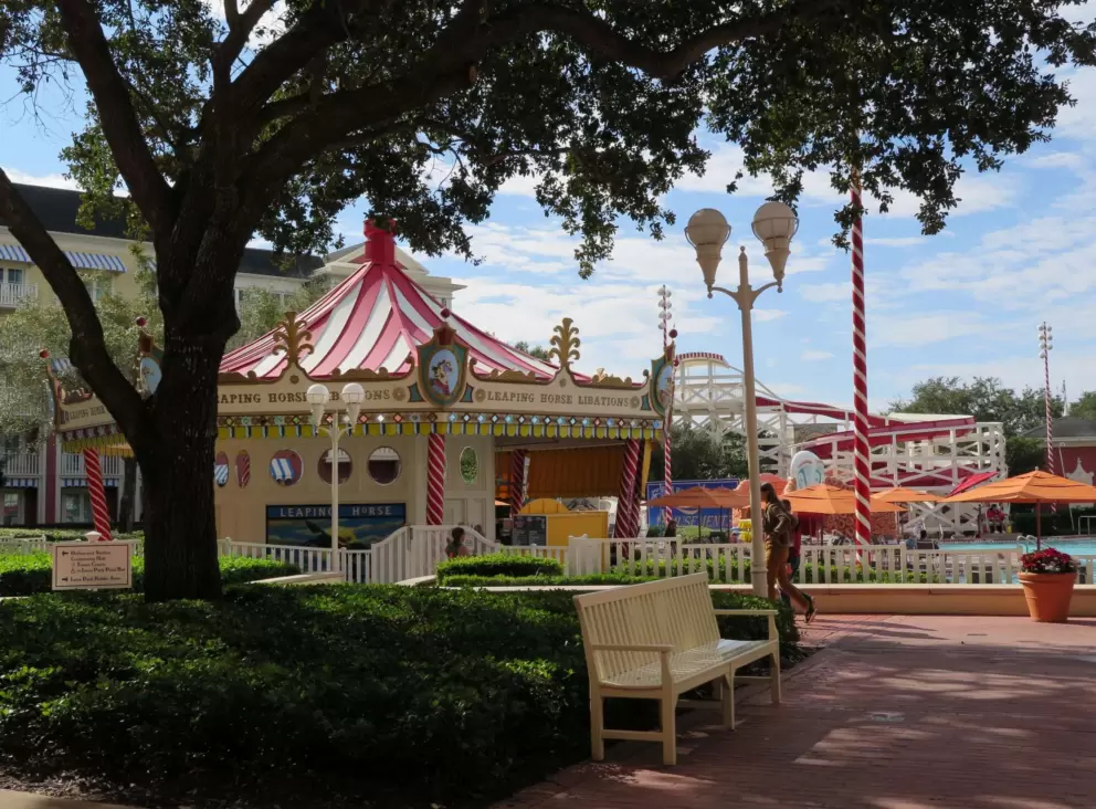 Pool with carousel-themed bar, at Boardwalk Resort.