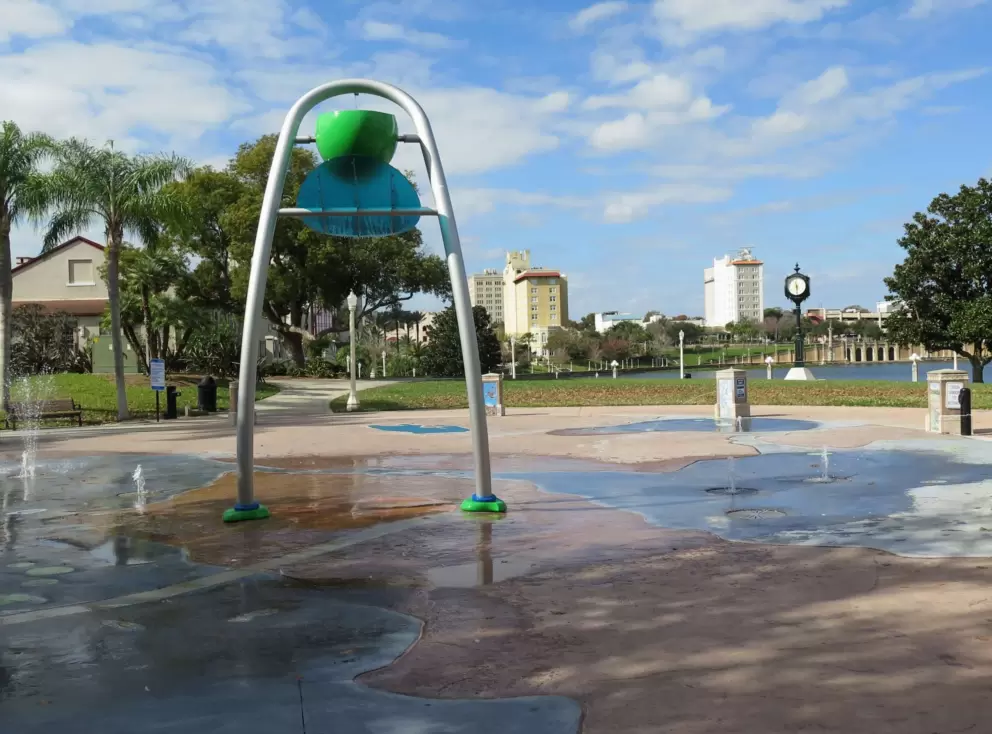 Bucket that dumps water on your head, on the splash pad, with views of the lake.