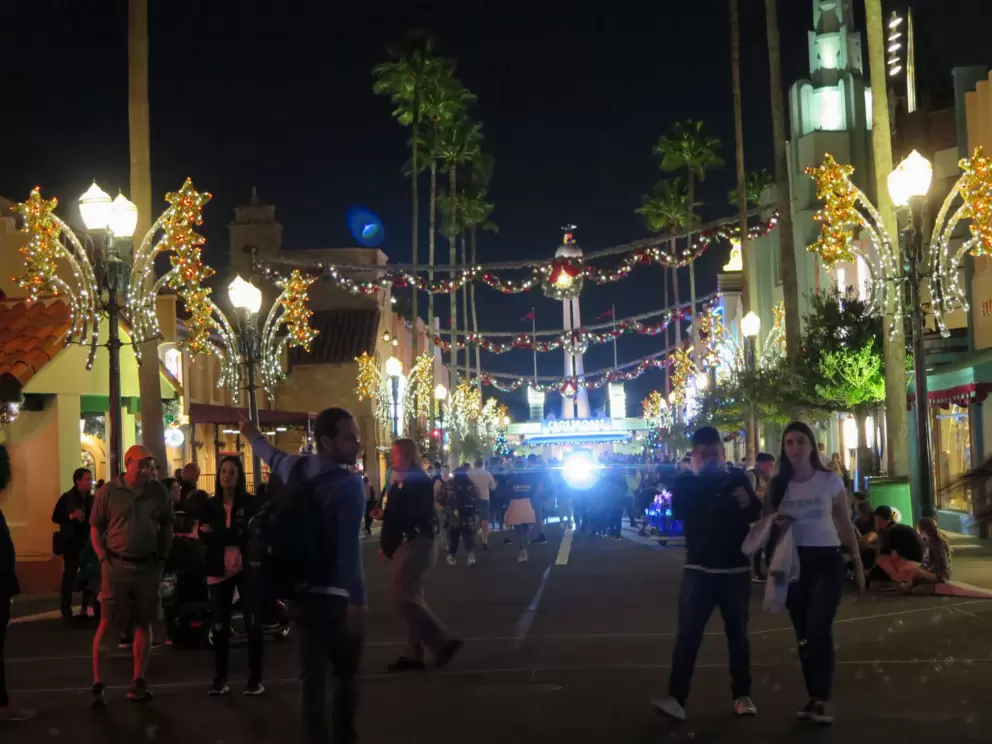 The main street at Christmastime at night.