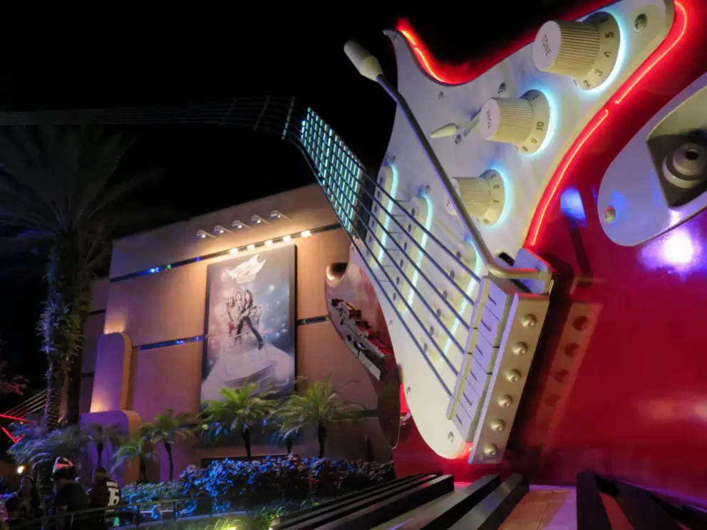 Giant electric guitar outside Rock n Roller Coaster ride.