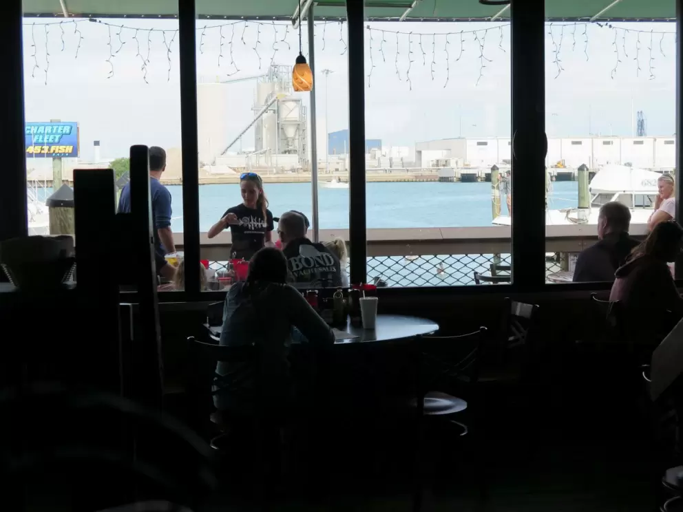 View from inside Grills Seafood Deck. It's kind of industrial across the water but still nice to see the blue inlet.
