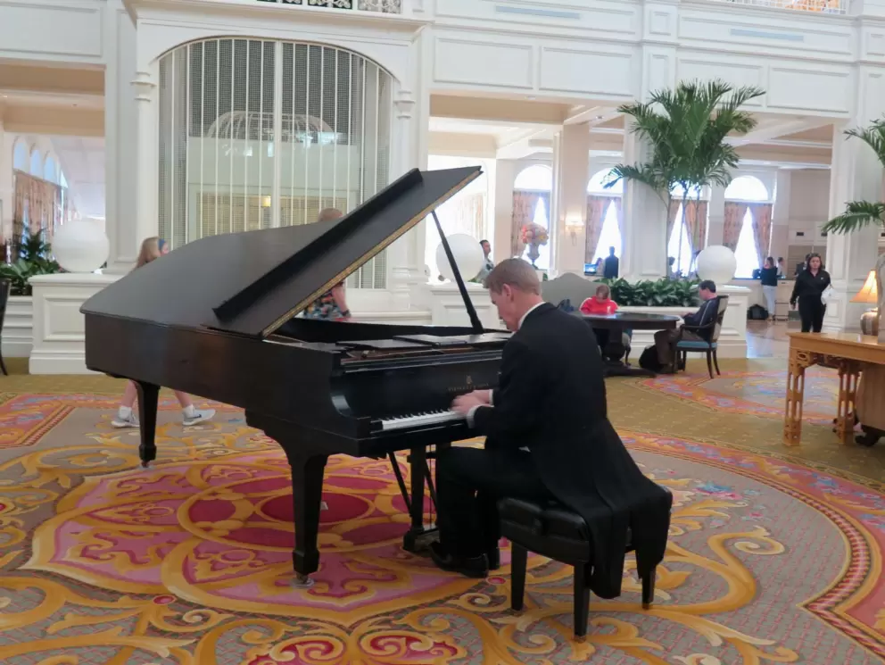 A pianist plays in the lobby of the Grand Floridian every afternoon.