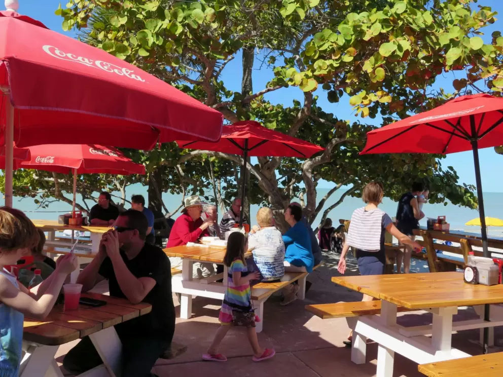 Shady seating right on the water, at Paradise Grille.