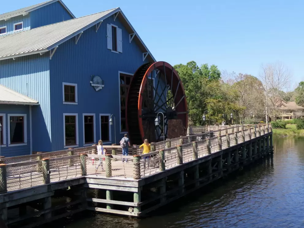 Water wheel the powers a cotton press inside the Riverside Mill food court.