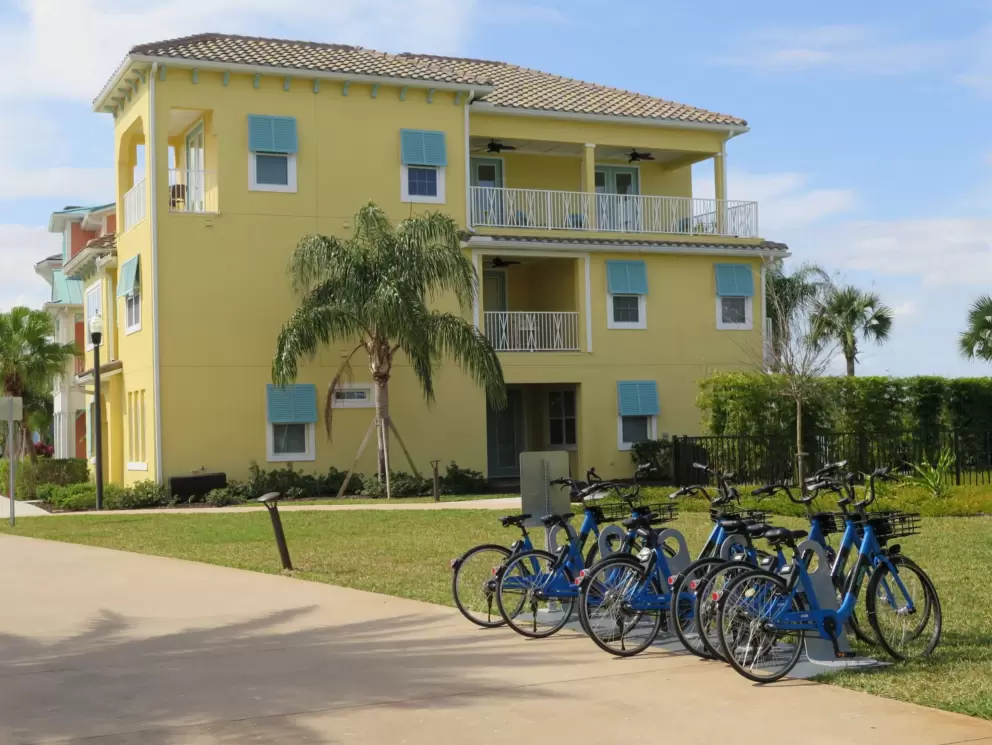 Bikes where the cottages begin, just near the pool.