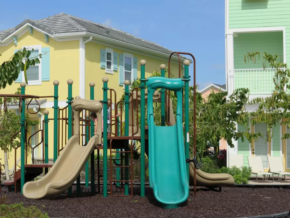 The playground is in a sweet location in the middle of the houses, keeping kids safe. 