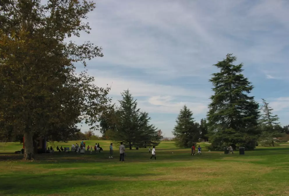 Trees and grass abound- nice for large gatherings. 