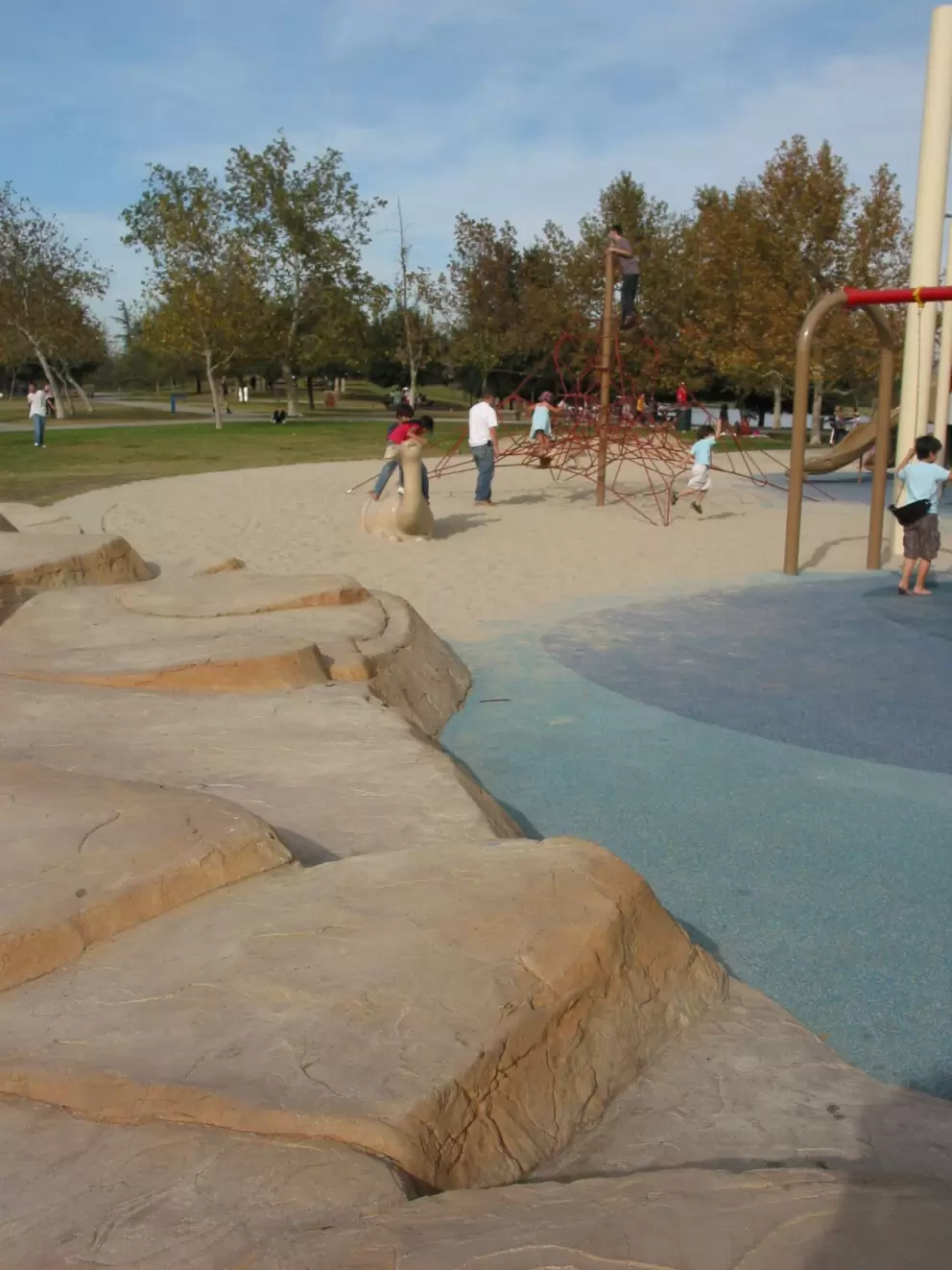 Awesome fake rocks where parents can sit and watch the action.