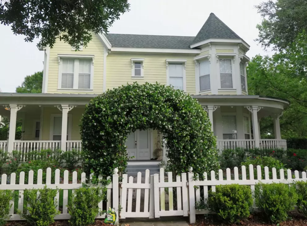 Victorian house with Jasmine arch.