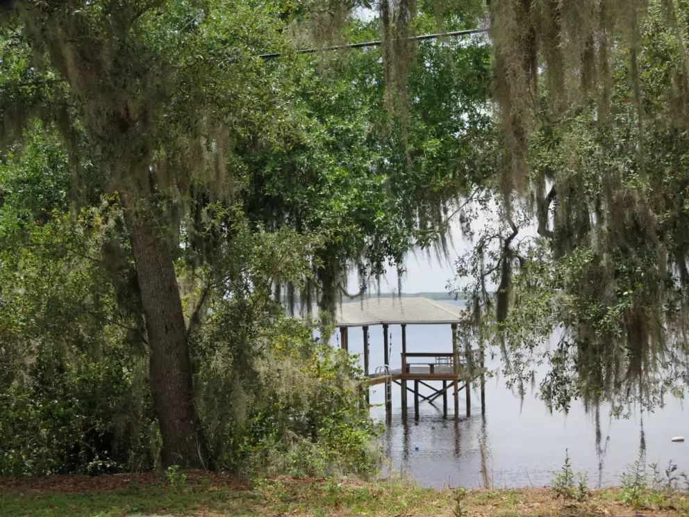 Dock on peaceful lake.