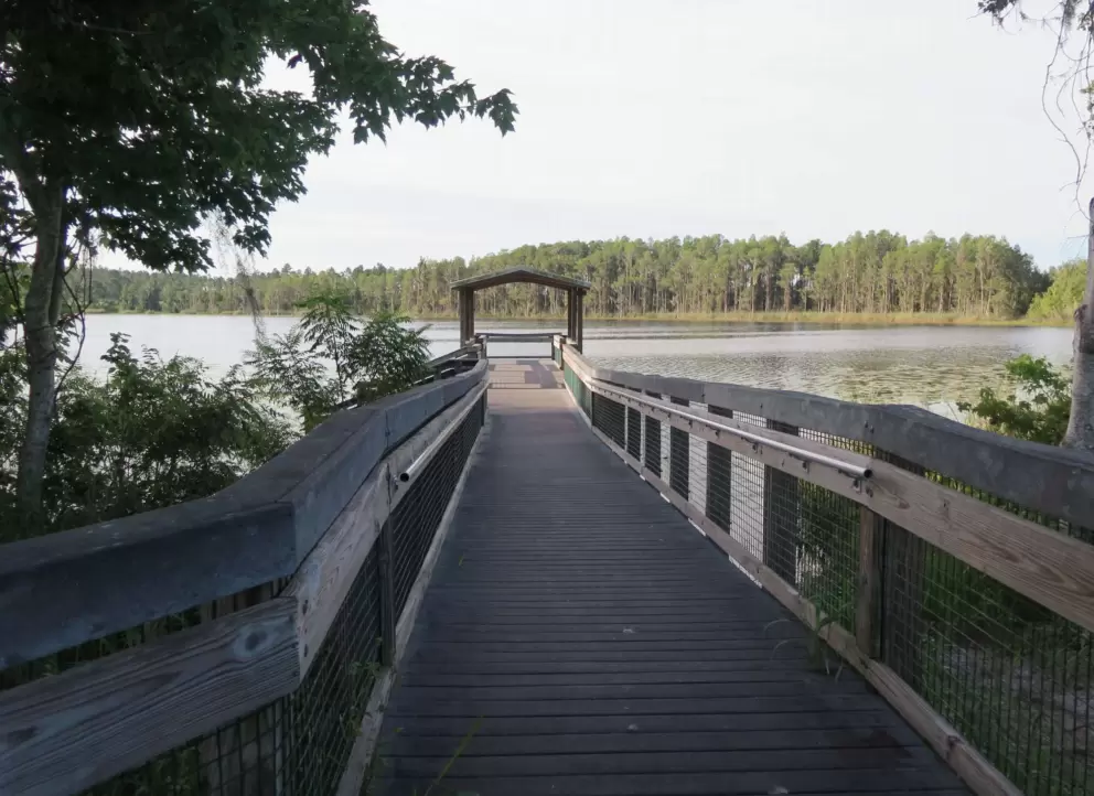 Walking to the end of the dock.