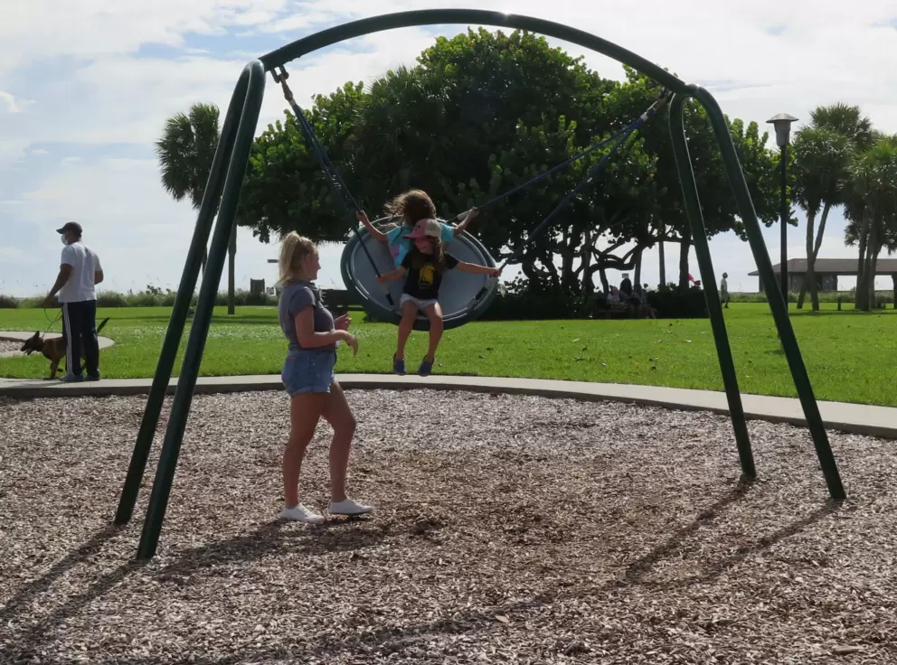 Disc swing that kids love at Humiston Beach Park.