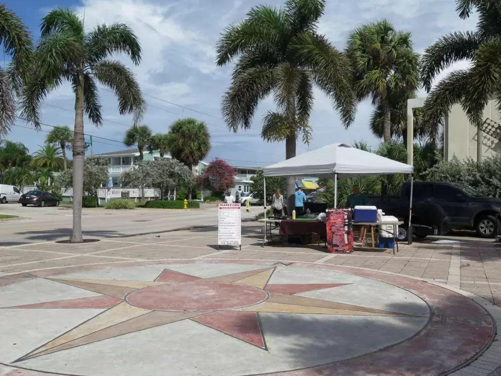 Compass in the sidewalk on Ocean Drive, by the farmer's market.
