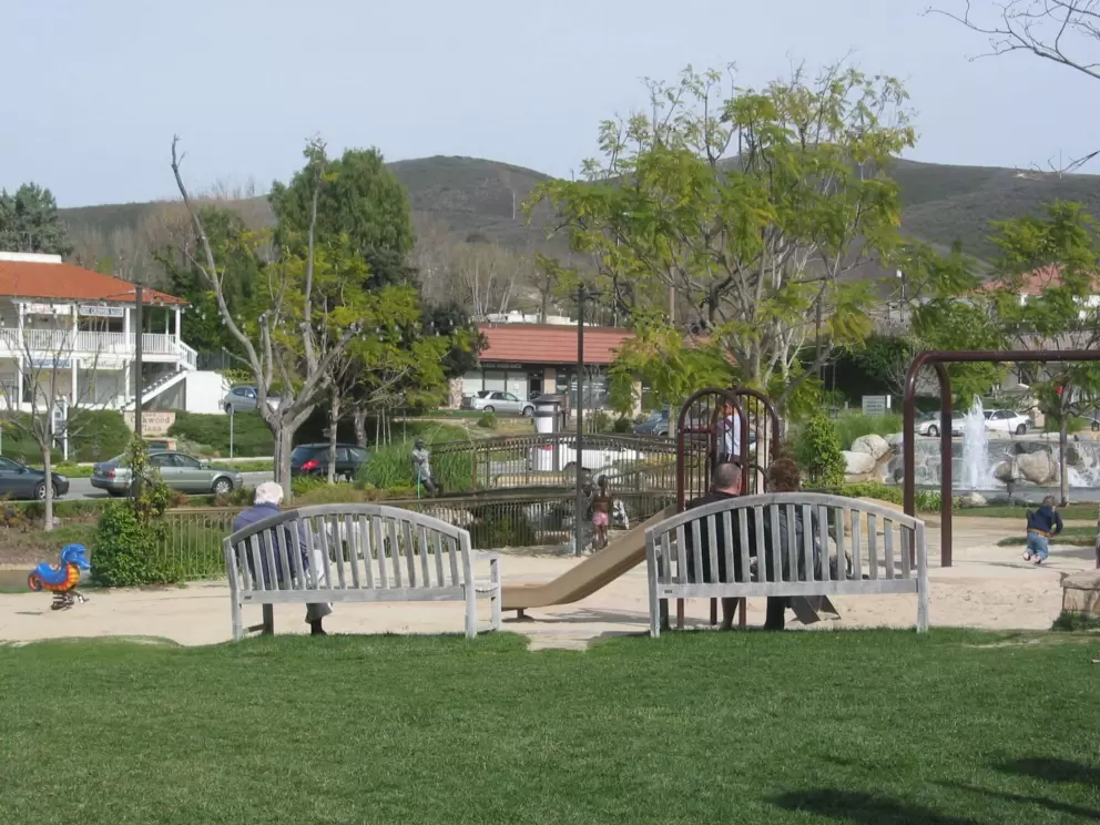 Sit on the wooden benches in the sun and enjoy the live music!