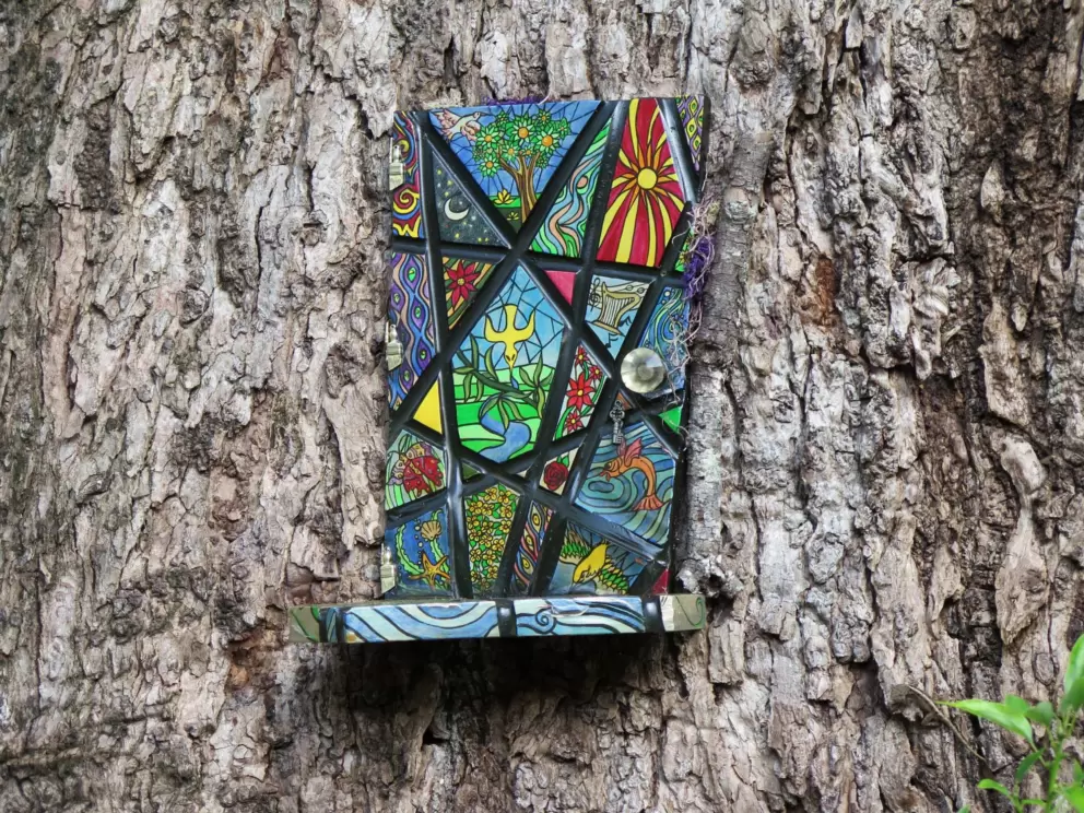 I like this unusual fairy door.
