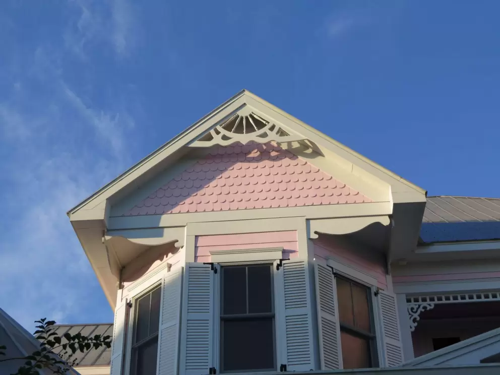 Shingles on the pink house.