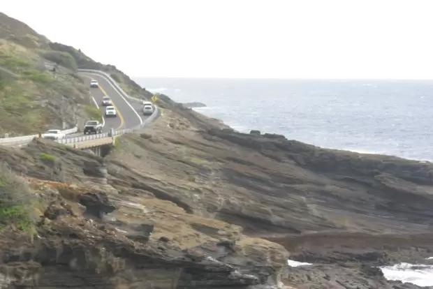 The road hugs the cliffs. 