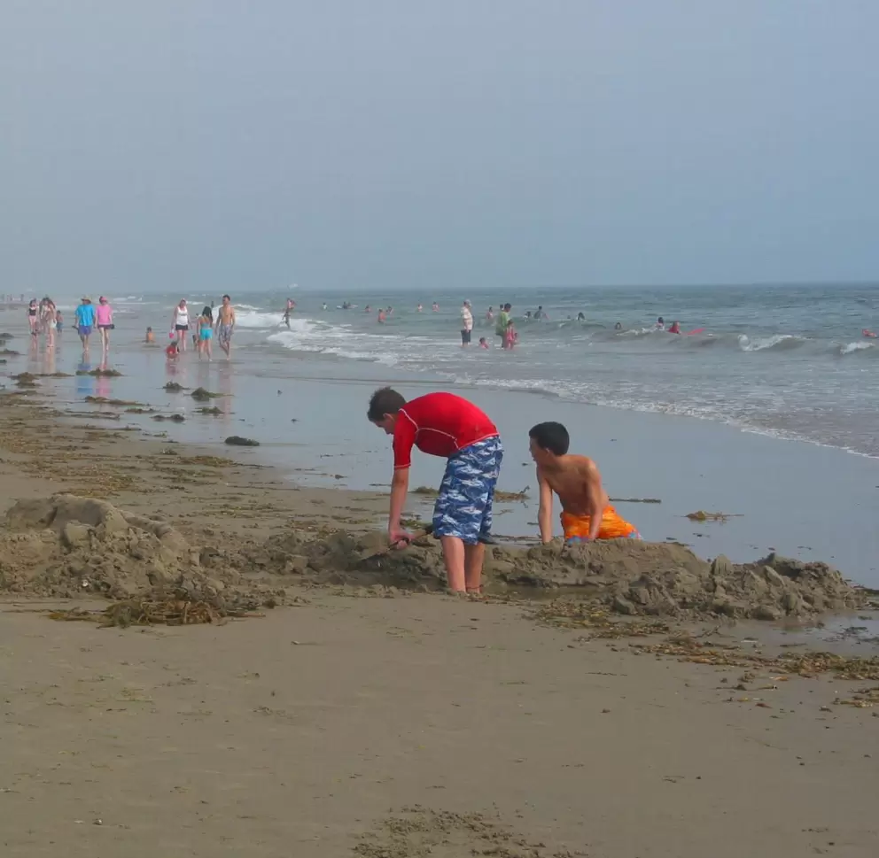 Boys play on Carpinteria Beach.
