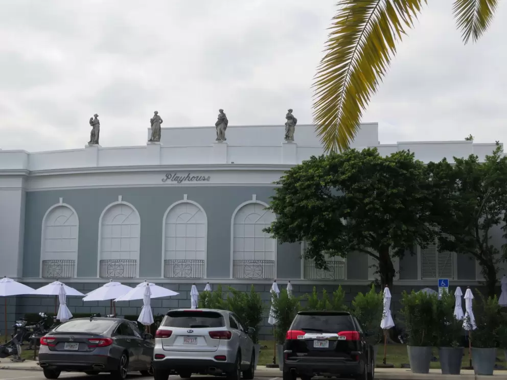 Playhouse with sculptures on the roof at Royal Poinciana Plaza.
