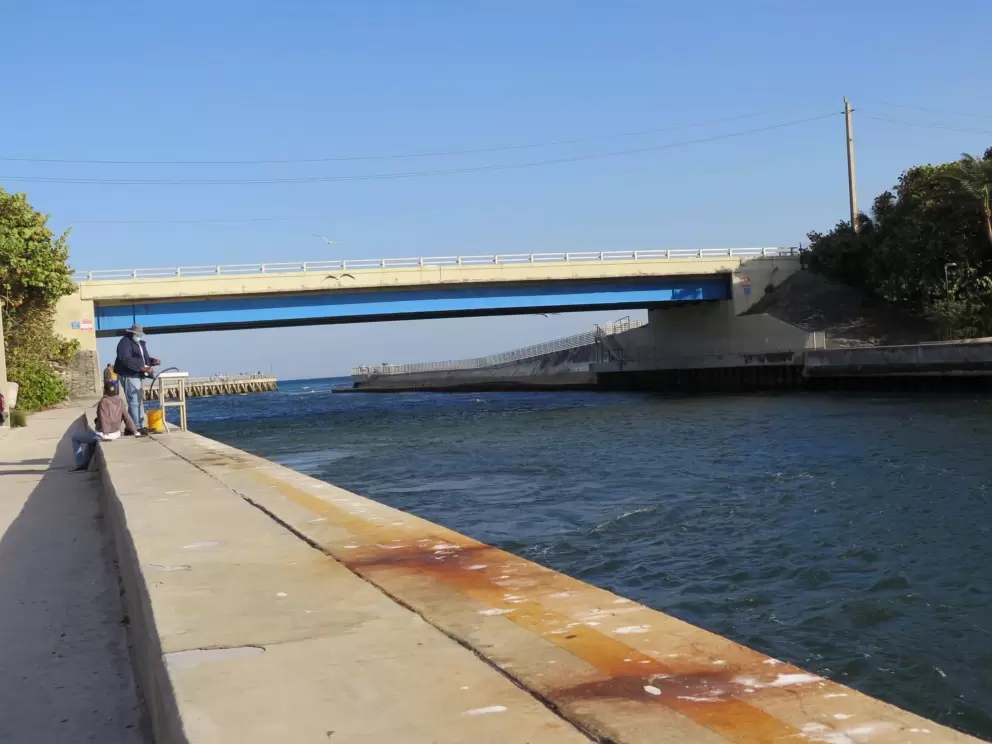 Fisherman and the bridge that is A1A Highway.