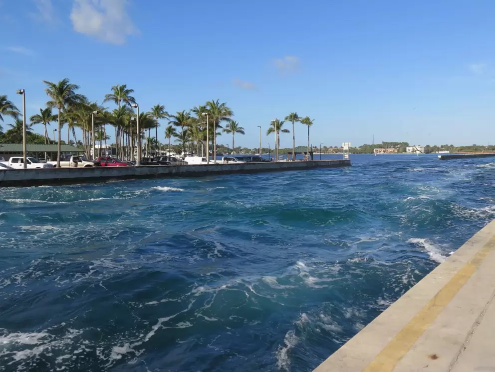 Choppy water as a boat goes by. Beautiful colors!