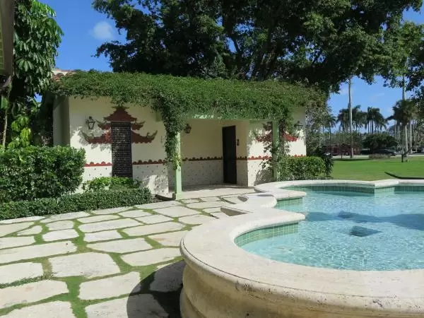Fountain and Asian-style restroom building.