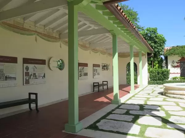Shady walkway with history plaques.